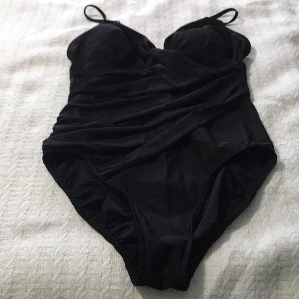 Black ruffled one piece swim suit